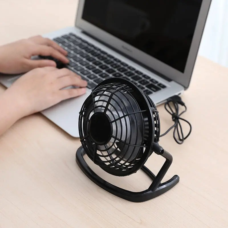 Mini 4-inch USB electric fan in pink, blue, and black with two-speed settings – quiet desktop cooling fan for home or office

