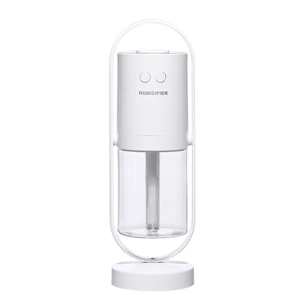 White humidifier with clear water tank on a white background