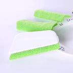 Green gap cleaning brush designed for window grooves, sliding door tracks, and tight corners

