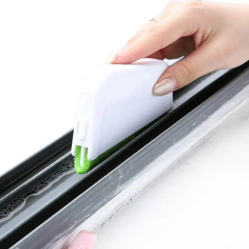 Green gap cleaning brush designed for window grooves, sliding door tracks, and tight corners

