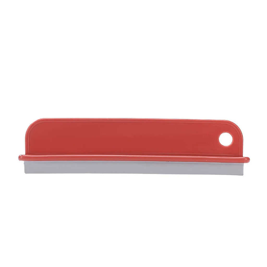 Squeegee for kitchen sink cleaning with flexible silicone blade.