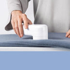 Rechargeable white fabric shaver with plastic case – portable lint and fuzz remover for sweaters and clothes

