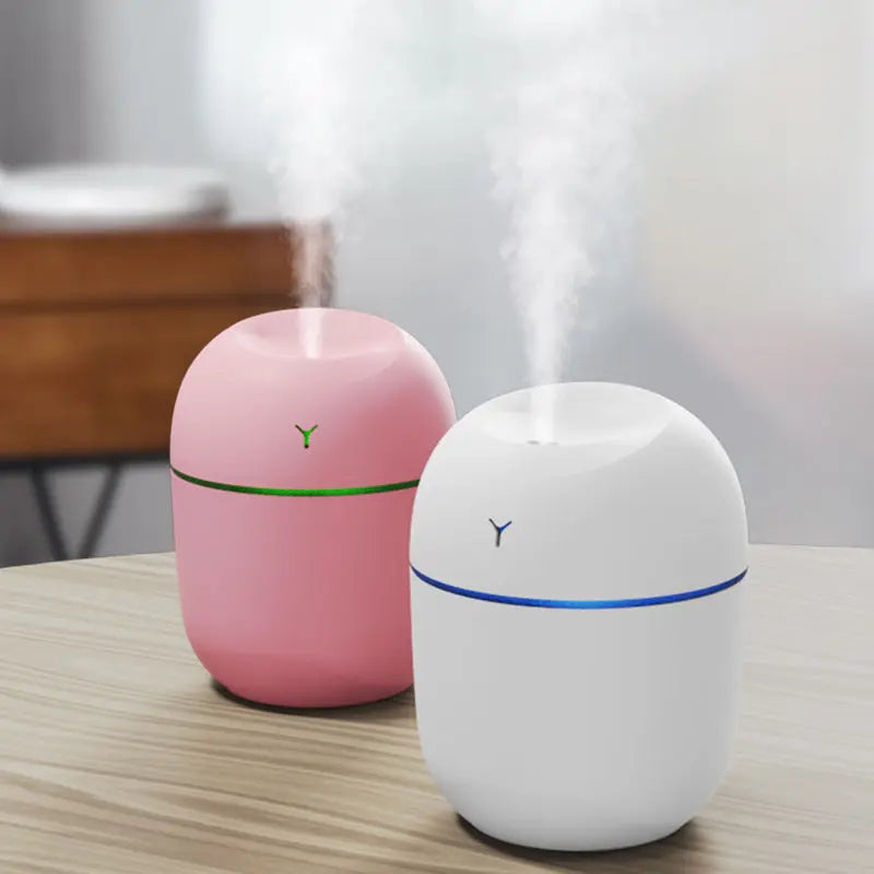 USB-powered mini humidifier in white, pink, and green – quiet 220ml ultrasonic diffuser for office desk or car