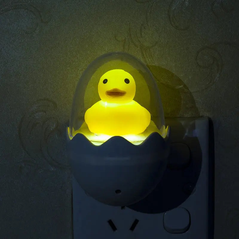 LED sensor night light in DCUK shape, ideal for children's rooms, bathrooms, and hallways with automatic light control
