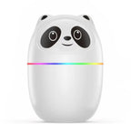 Mini USB essential oil humidifier in white, pink, and green with night light and cute pet design for desktop or bedroom use