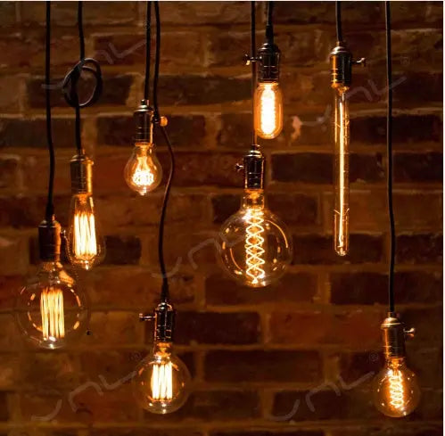 Retro Edison filament bulb with transparent glass and dimmable feature, available in various shapes like ST64, A19, G80 for vintage home lighting