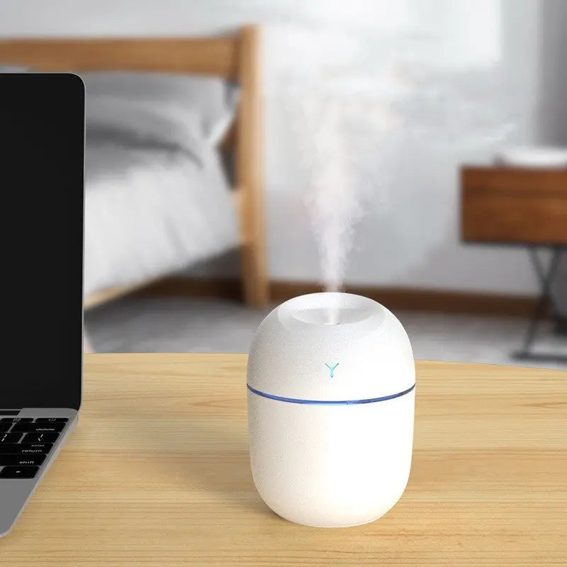 USB-powered mini humidifier in white, pink, and green – quiet 220ml ultrasonic diffuser for office desk or car