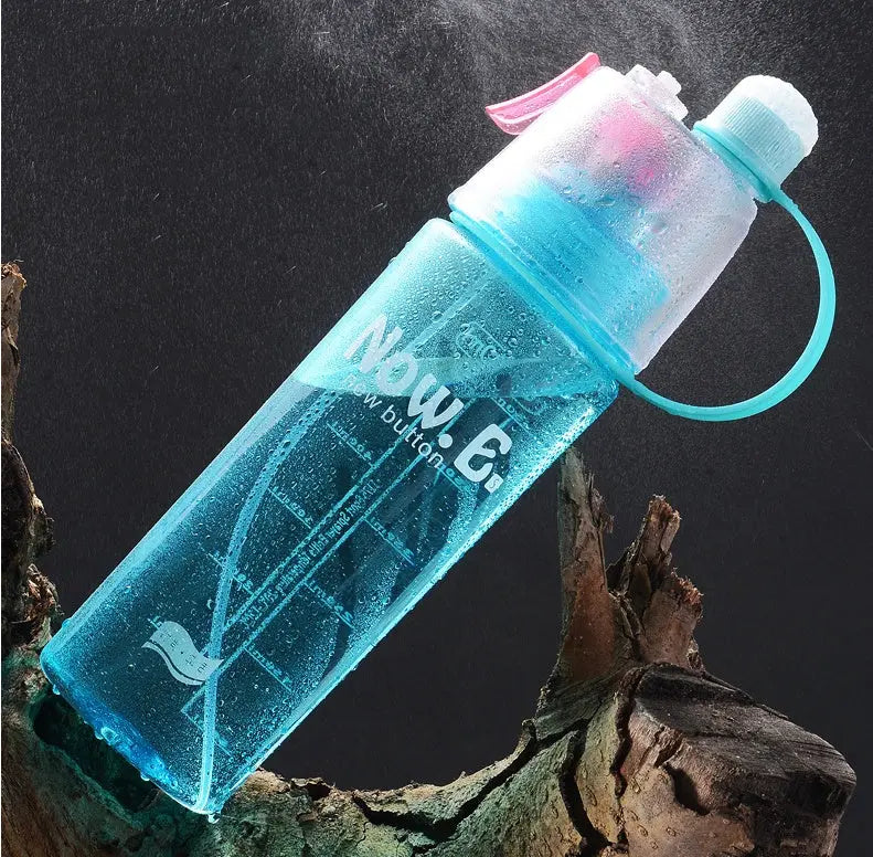 Leakproof travel spray bottle with cooling mist, shown upright on outdoor surface