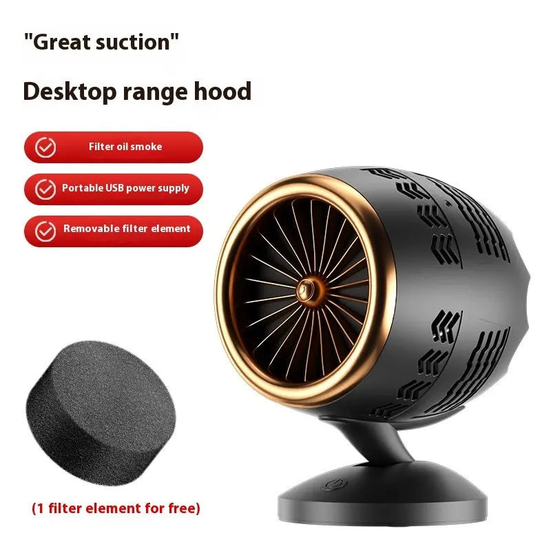 Portable small kitchen ventilator in black gold with filter element, USB-powered desktop smoke extractor fan