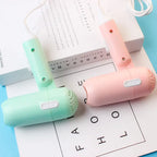 Mini foldable cartoon-style hair dryer in pastel colors – compact travel blow dryer with cold and hot air settings