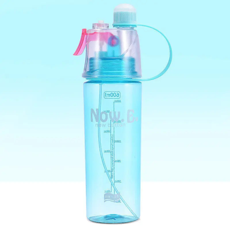 Sports spray bottle releasing fine mist, perfect for hot weather activities