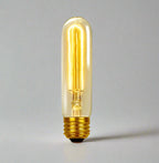 Retro Edison filament bulb with transparent glass and dimmable feature, available in various shapes like ST64, A19, G80 for vintage home lighting