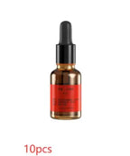 Bottle of skincare serum with a red label on a white background