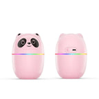 Two pink panda-shaped USB devices on a white background