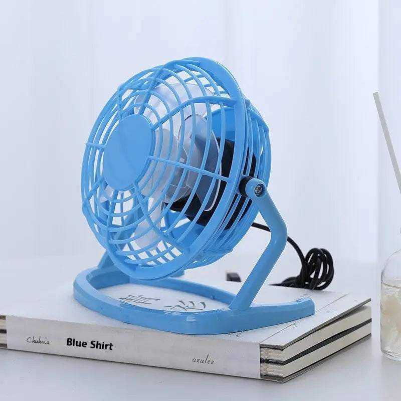 Mini 4-inch USB electric fan in pink, blue, and black with two-speed settings – quiet desktop cooling fan for home or office

