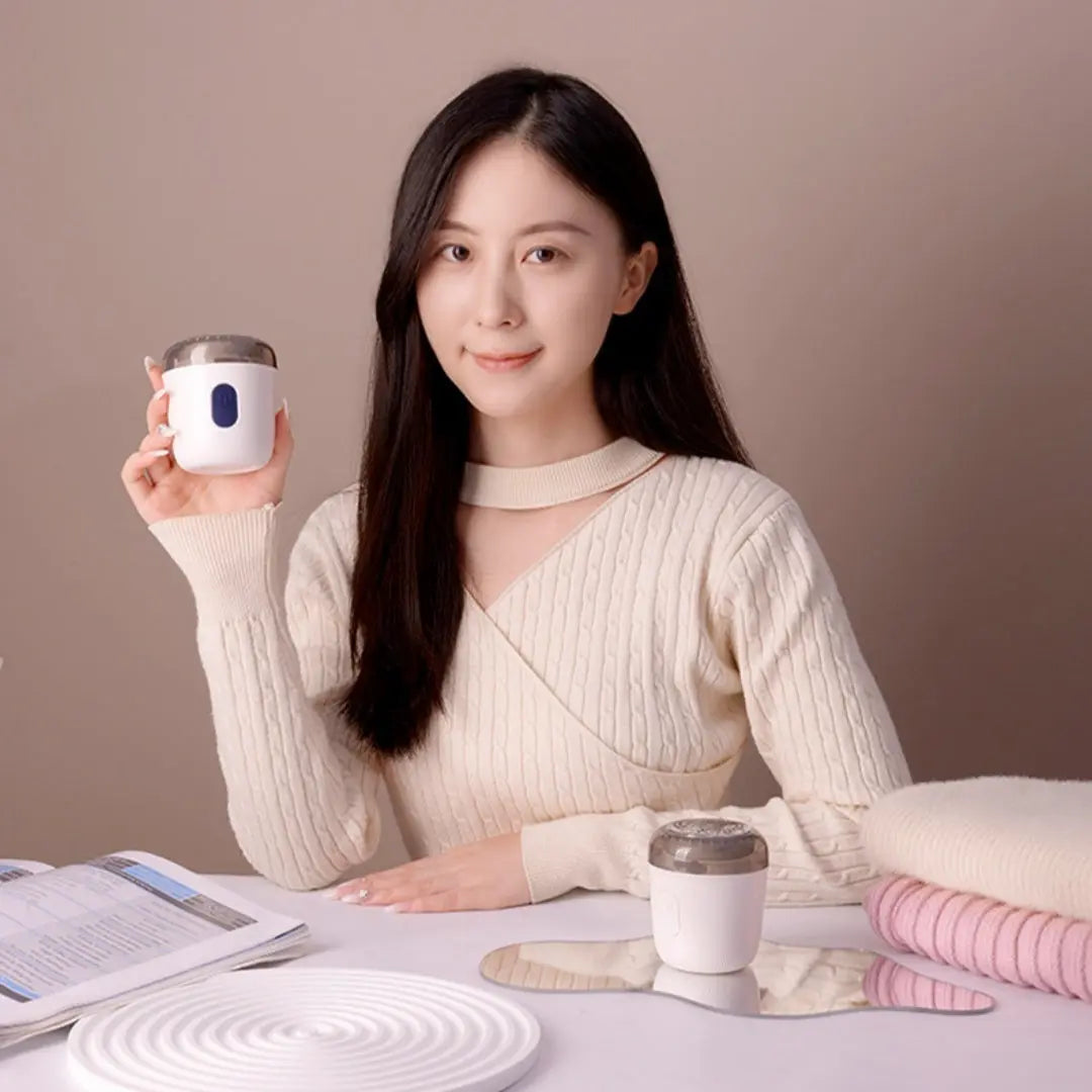 Compact rechargeable fabric lint remover with 6-blade stainless steel cutter and Type-C port – ideal for clothes and home use