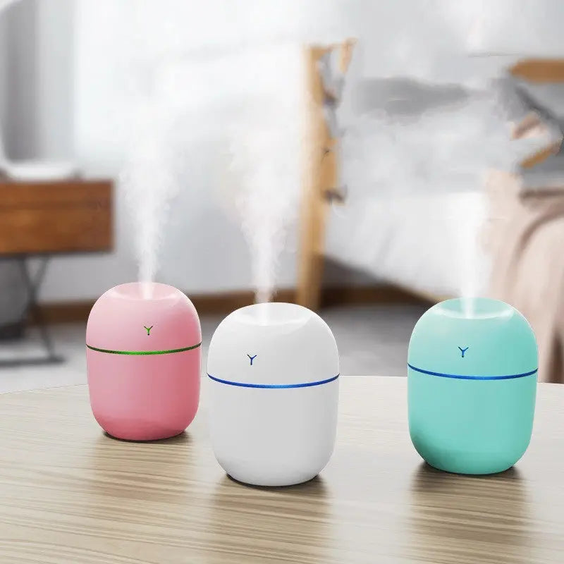 USB-powered mini humidifier in white, pink, and green – quiet 220ml ultrasonic diffuser for office desk or car