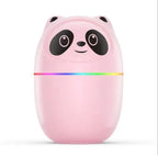 Pink panda-shaped device with a rainbow-colored band.